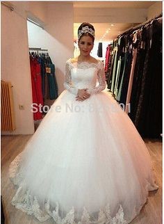 Robe mariée dentelle manche longue