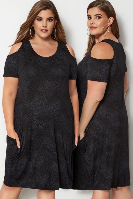 Robe noire cintrée manches longues